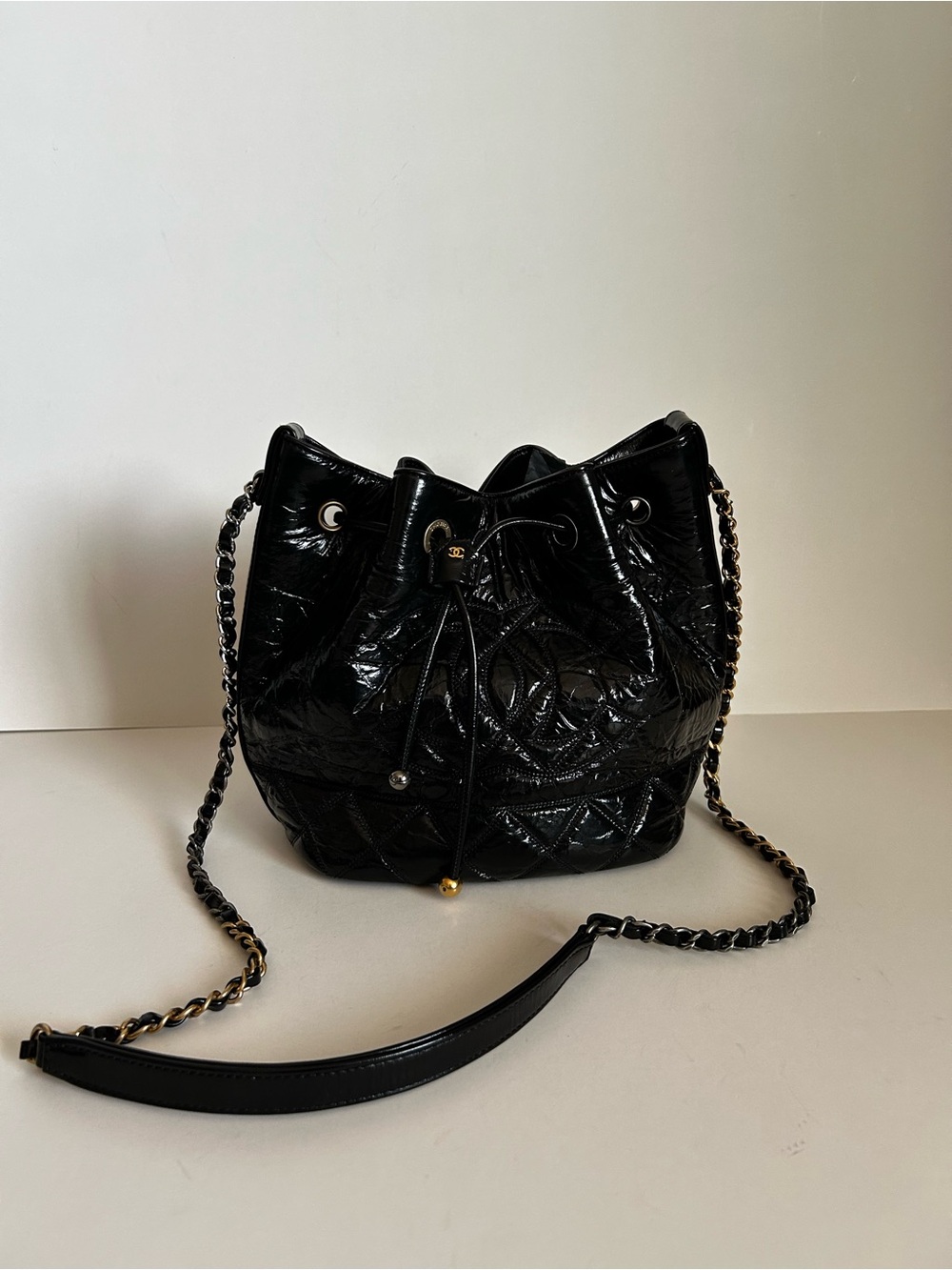 CHANEL Black Quilted Patent Leather Drawstring Bucket Bag